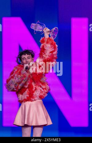 Malmo, Sweden. 12th May, 2024. Nemo from Switzerland celebrates after winning the final of the Eurovision Song Contest (ESC) 2024 with his song 'The Code'. In the world's biggest singing competition under the motto 'United By Music', 25 countries compete against each other in the final. Photo: Jens Büttner/dpa Credit: dpa picture alliance/Alamy Live News Stock Photo