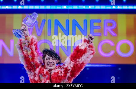 Malmo, Sweden. 12th May, 2024. Nemo from Switzerland celebrates after winning the final of the Eurovision Song Contest (ESC) 2024 with his song 'The Code'. In the world's biggest singing competition under the motto 'United By Music', 25 countries compete against each other in the final. Photo: Jens Büttner/dpa Credit: dpa picture alliance/Alamy Live News Stock Photo