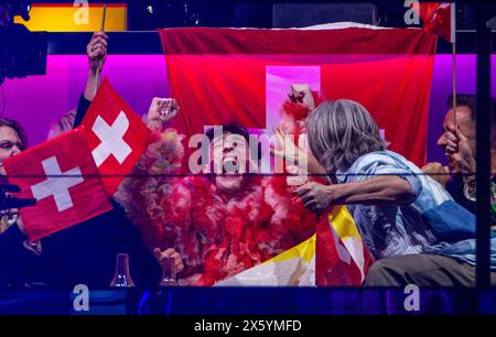 Malmo, Sweden. 12th May, 2024. Nemo from Switzerland cheers as he scores points in the final of the Eurovision Song Contest (ESC) 2024. 25 countries will compete against each other in the final of the world's biggest singing competition under the motto 'United By Music'. Photo: Jens Büttner/dpa Credit: dpa picture alliance/Alamy Live News Stock Photo