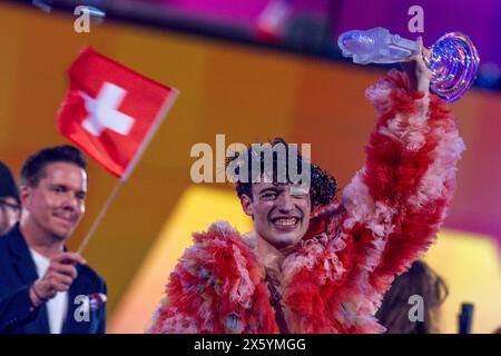 Malmo, Sweden. 12th May, 2024. Nemo from Switzerland celebrates after winning the final of the Eurovision Song Contest (ESC) 2024 with his song 'The Code'. In the world's biggest singing competition under the motto 'United By Music', 25 countries compete against each other in the final. Photo: Jens Büttner/dpa Credit: dpa picture alliance/Alamy Live News Stock Photo