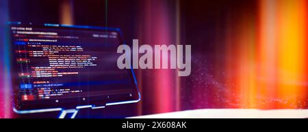 Work from home. Programmer coding code on notebook screen at Stock Photo