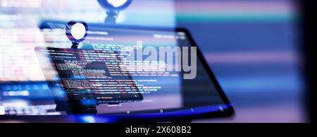 Work from home. Programmer coding code on notebook screen at Stock Photo