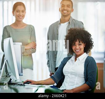 People, office and happy with computer for teamwork and collaboration as web developers. Employee, portrait and smile with pride on skill development Stock Photo