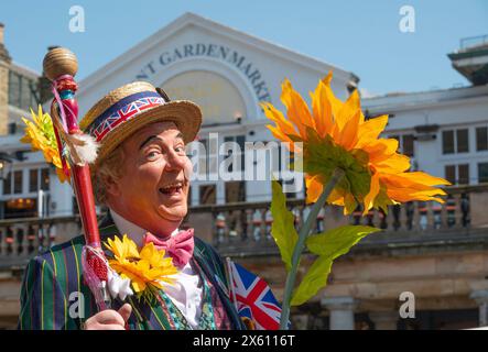 London, UK. 12th May, 2024. Covent Garden May Fayre and Puppet Festival, celebrating Mr Punch's 362nd birthday - starts with a procession around the area led by the Superior Brass Band before a service in St Paul's Church and Punch and Judy shows all afternoon behind the church. Credit: Phil Robinson/Alamy Live News Stock Photo