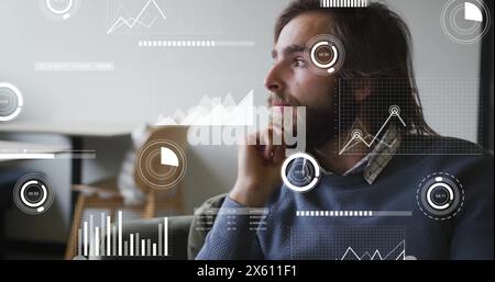 Image of infographic interface over caucasian businessman thinking and looking away in office Stock Photo