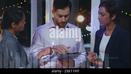 Image of multiple graphs over diverse coworkers discussing reports on digital tablet in office Stock Photo