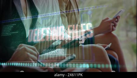 Image of data processing over people using digital devices Stock Photo