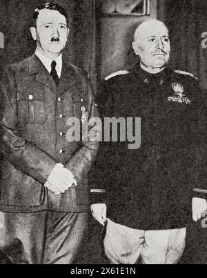 Hitler's meeting with Mussolini in an attempt to gain new allies, 23-28 October, 1940.  Adolf Hitler, 1889 – 1945. German politician, demagogue, Pan-German revolutionary, leader of the Nazi Party, Chancellor of Germany, and Führer of Nazi Germany from 1934 to 1945. Benito Amilcare Andrea Mussolini, 1883 – 1945. Italian dictator, journalist, founder and leader of the National Fascist Party (PNF), and Prime Minister of Italy.  From The War in Pictures, Sixth Year. Stock Photo