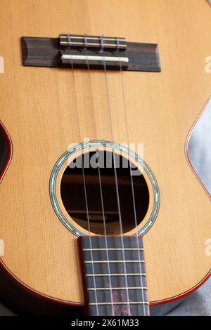 Tenor Ukulele, a popular four-string musical instrument. Stock Photo