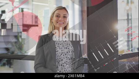 Image of infographic interface over caucasian female professional in office Stock Photo