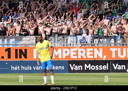 Waalwijk, Netherlands. 12th May, 2024. WAALWIJK, NETHERLANDS - MAY 12: supporters zwolle with shirts off during the Dutch Eredivisie match between RKC Waalwijk and PEC Zwolle at Mandemakers stadion on May 12, 2024 in Waalwijk, Netherlands. (Photo by Peter Lous/Orange Pictures) Credit: Orange Pics BV/Alamy Live News Stock Photo