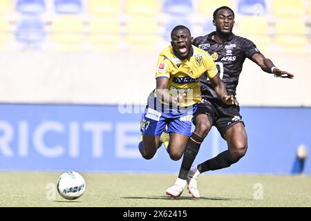 Sint Truiden, Belgium. 12th May, 2024. STVV's Aboubakary Koita and Mechelen's Mory Konate fight for the ball during a soccer match between Sint-Truidense VV and KV Mechelen, Sunday 12 May 2024 in Sint-Truiden, on day 8 (out of 10) of the Europe Play-offs of the 2023-2024 'Jupiler Pro League' first division of the Belgian championship. BELGA PHOTO JOHAN EYCKENS Credit: Belga News Agency/Alamy Live News Stock Photo