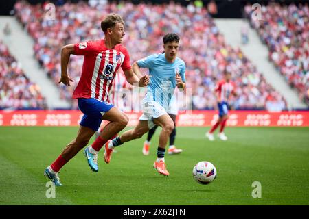 Madrid, Spain. 12th May, 2024. Marcos Llorente of Atletico de Madrid runs with the ball during the LaLiga EA Sports match between Atletico Madrid and Celta Vigo at Civitas Metropolitano Stadium on May 12, 2024 in Madrid, Spain. (Photo by QSP) Credit: QSP/Alamy Live News Stock Photo