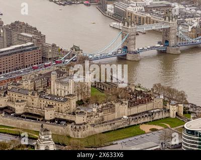 Elevated view of the Tower of London with Tower Bridge in the distance. London Stock Photo