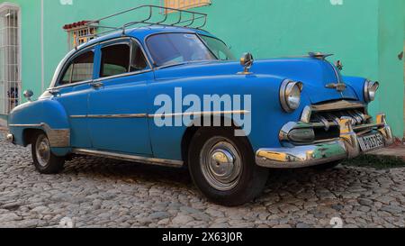 279 Old blue American almendron classic car -Chevrolet from 1952- stationed on Calle Boca Street, Plaza Mayor Square colonial area. Trinidad-Cuba. Stock Photo