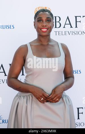London, UK. 12th May, 2024. Lashana Lynch photographed arriving at the BAFTA TV Awards with P&O Cruises 2024 on Sunday 12 May 2024 at Royal Festival Hall, London. Picture by Julie Edwards. Credit: JEP Celebrity Photos/Alamy Live News Stock Photo