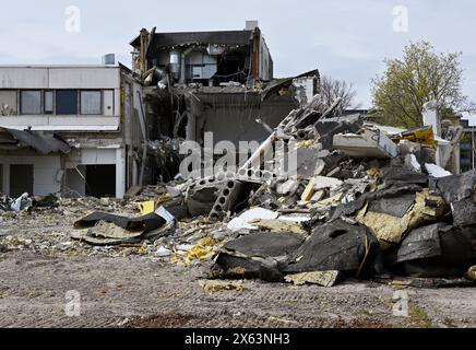 demolition of an old concrete school building Stock Photo