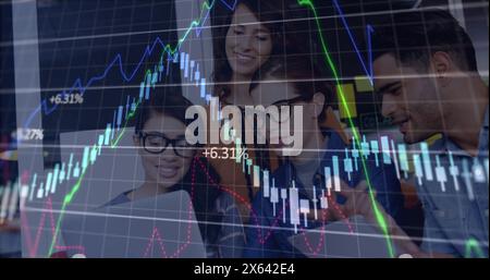 Image of financial data processing against team of diverse colleagues discussing at office Stock Photo