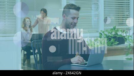 Image of statistical data processing over thoughtful caucasian man using laptop at office Stock Photo
