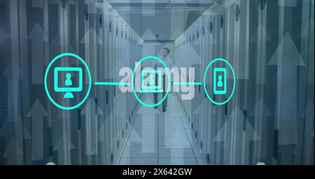 Image of network of icons, arrow icons over caucasian male engineer walking in server room Stock Photo