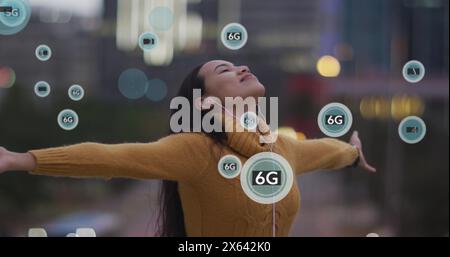 Image of 5g and 6g texts over biracial woman listening to music while enjoying breeze Stock Photo