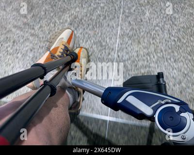 The leg of a disabled person crossed. Stock Photo