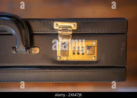 Old briefcase with lock code. Stock Photo
