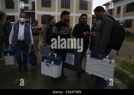 May 12, 2024, Pulwama, Jammu And Kashmir, India: Parliamentary election polling teams have been dispatched from Pulwama to their respective polling stations. With all arrangements in place, the polling for 4th phase of ongoing Lok Sabha elections is all set to commence on May 13 in the 2-Srinagar Parliamentary Constituency (PC). A total of 17, 47,810 lakh voters have been enrolled in phase IV, including 8, 75,938 male and 8, 71,808 female voters besides 64 third gender electorates. There are around 11682 Persons with Disability and 705 persons above the age of 100 years who will also be exerci Stock Photo