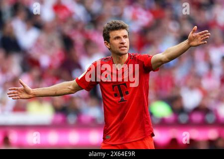 Munich, Germany. . 12th May, 2024. Fussball 1. Bundesliga 33. Spieltag FC Bayern Muenchen - VfL Wolfsburg am 12.05.2024 in der Allianz Arena in Muenchen Thomas Mueller ( Muenchen ) DFL regulations prohibit any use of photographs as image sequences and/or quasi-video. Foto: Revierfoto Credit: ddp media GmbH/Alamy Live News Credit: ddp media GmbH/Alamy Live News Stock Photo