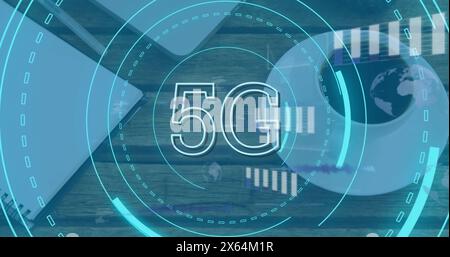Image of 5g text and data processing against close up of a laptop and coffee cup on wooden table Stock Photo