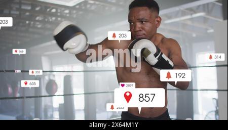 Image of notification bars over african american boxer practicing punches in ring Stock Photo