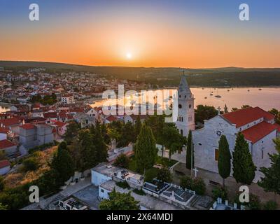 Primosten, Croatia - Aerial view of St. George's Church and cemetery on Primosten peninsula and old town on a sunny summer morning in Dalmatia, Croati Stock Photo