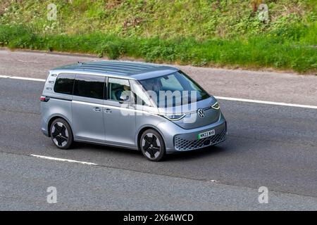 2023 Silver VW Volkswagen ID Buzz 1st Edition MPV battery only, Pro 77kWh 5dr Auto travelling on the M61 motorway UK Stock Photo