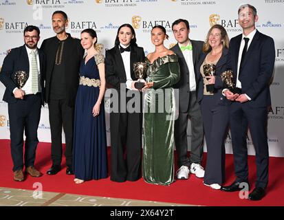 Royal Festival Hall, LONDON, ENGLAND, UK - MAY 12 2024: Paul Bazely, Louise Brealey, Kat Sadler, Lizzie Davidson and Freddie Meredith pose with the Award for Scripted Comedy for 'Such Brave Girls' in the Winners Room during the 2024 BAFTA Television Awards with P&O Cruises, London, UK. Credit: See Li/Picture Capital/Alamy Live News Stock Photo