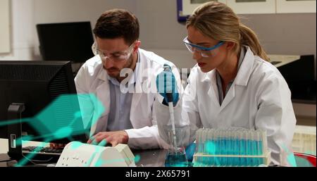 Image of formulas and data processing over caucasian female and male lab workers Stock Photo