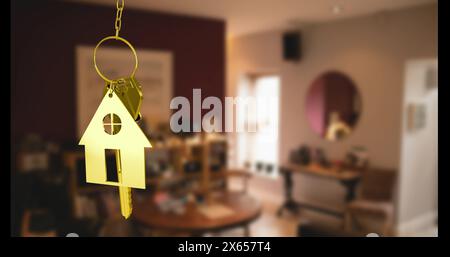 Image of golden key and house over house interior Stock Photo
