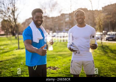 Two friends are ready for jogging in the city. Stock Photo