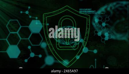 Digital shield glowing on screen, showing cybersecurity Stock Photo
