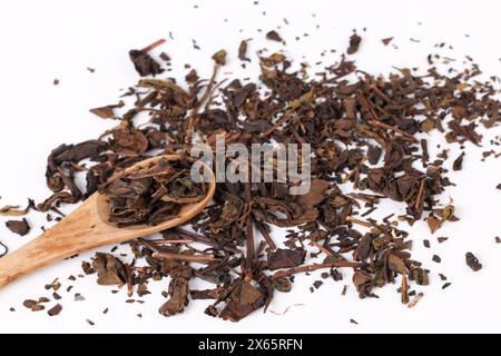 Tea leaves on a spoon. Stock Photo