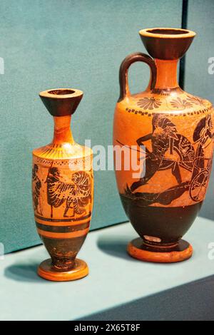 Antique ceramic decorative amphora on a white background. Clay jugs and a pot, a set of ancient utensils for drinking wine, water or milk. High qualit Stock Photo