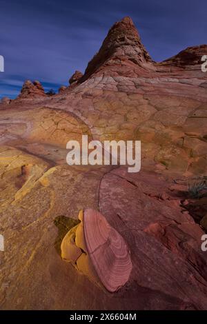 A rock has a swirled formation, a truly unique formation in the Stock Photo