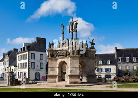 Pleyben, France - August 29 2021: The monumental Calvary placed in front of the church is the most massive in all of Brittany. Stock Photo