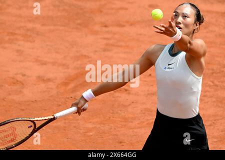 Rome, Italy. 13th May, 2024. Qinwen Zheng of China in action during the match against Naomi Osaka of Japan at the Internazionali BNL d'Italia 2024 tennis tournament at Foro Italico in Rome, Italy on May 13, 2024. Credit: Insidefoto di andrea staccioli/Alamy Live News Stock Photo