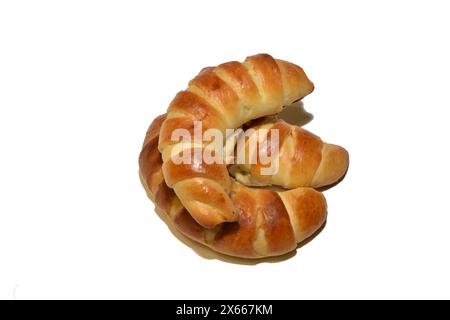 Three rolls with filling lie on a white background. Stock Photo