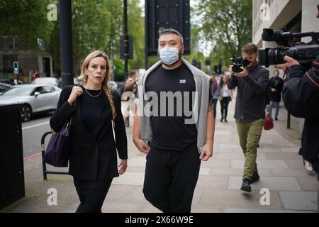 Chi Leung Wai (right) leaves Westminster Magistrates' Court, central London, where he was freed on bail after appearing charged under the National Security Act of assisting a foreign intelligence service in Hong Kong. Chi Leung (Peter) Wai, 38, of Staines-upon-Thames, Matthew Trickett, 37, of Maidenhead, and Chung Biu Yuen, 63, of Hackney, have each been charged with assisting a foreign intelligence service, contrary to section 3(1) and (9) of the National Security Act 2023. They have also each been charged with foreign interference, contrary to section 13(2) and (7) of the National Security A Stock Photo