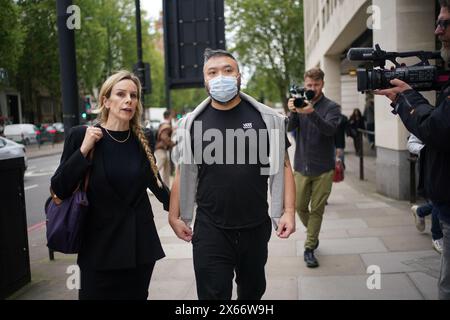 Chi Leung Wai (right) leaves Westminster Magistrates' Court, central London, where he was freed on bail after appearing charged under the National Security Act of assisting a foreign intelligence service in Hong Kong. Chi Leung (Peter) Wai, 38, of Staines-upon-Thames, Matthew Trickett, 37, of Maidenhead, and Chung Biu Yuen, 63, of Hackney, have each been charged with assisting a foreign intelligence service, contrary to section 3(1) and (9) of the National Security Act 2023. They have also each been charged with foreign interference, contrary to section 13(2) and (7) of the National Security A Stock Photo