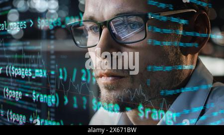 Close-up Portrait of Software Engineer Working on Computer, Line of Code Run Aroung Him. Developer Working on Innovative e-Commerce Application using Big Data Concept Stock Photo