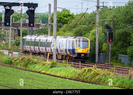 Northern rail class 195 diesel multiple unit at Winwick on the West Coast main line. Stock Photo