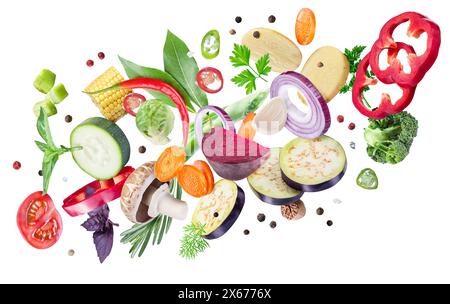 Variety of slices and pieces of fresh organic vegetable levitating in air. File contains clipping paths. Stock Photo