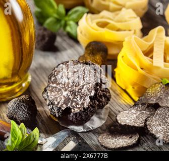 Summer truffles and truffle slices isolated on white background. Close-up. Stock Photo